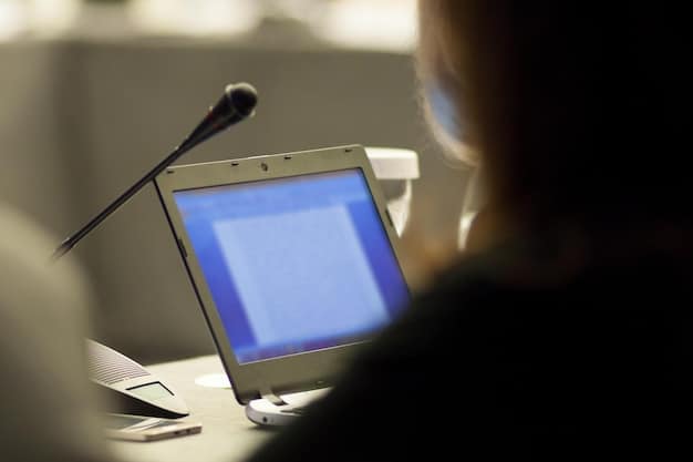 A detailed view of a fact-checker working at a computer, highlighting the tools and processes used to verify information during a public debate.