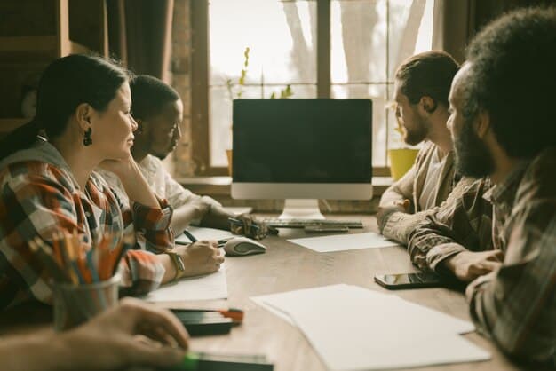 A classroom setting where students are actively engaged in analyzing different news articles and online sources. The focus is on identifying bias, verifying information, and understanding different perspectives.