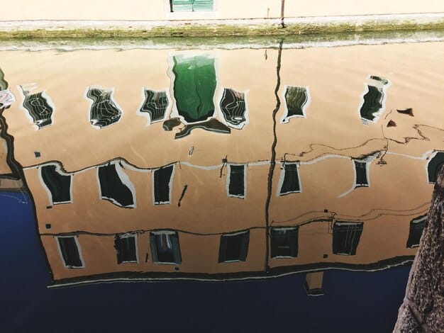 A flooded coastal city, illustrating the economic devastation caused by rising sea levels due to climate change. The image shows damaged buildings and abandoned infrastructure, highlighting the financial consequences of ignoring scientific evidence on climate change.