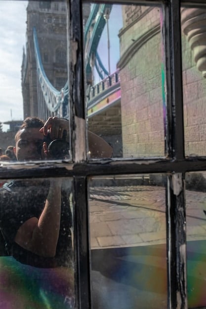 A split image contrasting a church with stained glass windows on one side and a gay pride parade on the other, visually representing the conflict between religious values and LGBTQ+ rights.