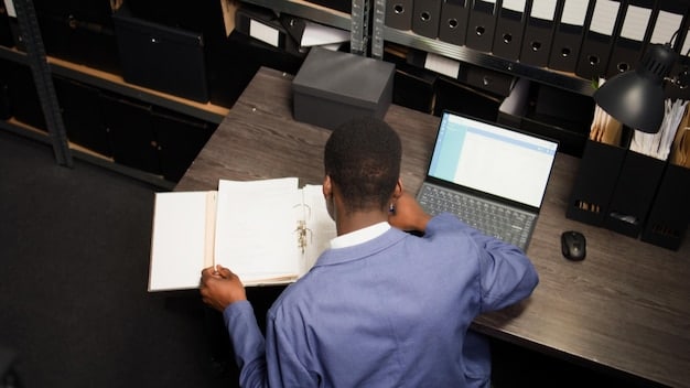 A person writing a detailed account of an incident, sitting at a desk with documents and a laptop, emphasizing the importance of accuracy and thoroughness in preparing a civil rights complaint.