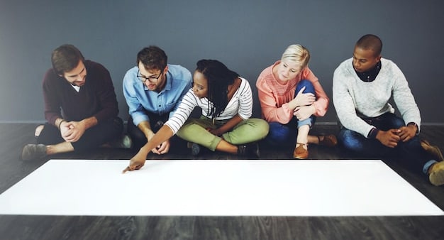 A group of people sitting around a table, brainstorming and writing ideas on a whiteboard during a fundraising planning meeting.