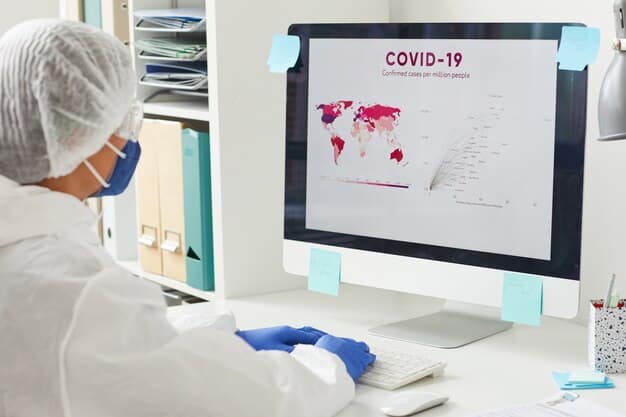 A public health official using a dashboard on a computer to monitor the spread of a virus with visual representations of outbreaks across a map.