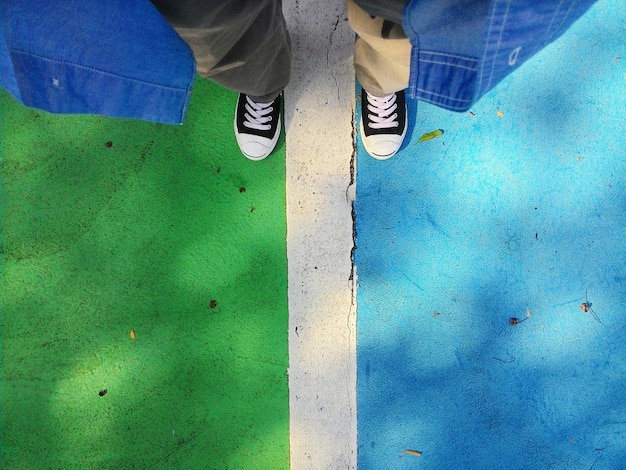 A split image showing two different paths: one path leads to a diverse and inclusive college campus, symbolizing the benefits of affirmative action, and the other path leads to a homogenous campus, representing the potential consequences of restricting affirmative action.