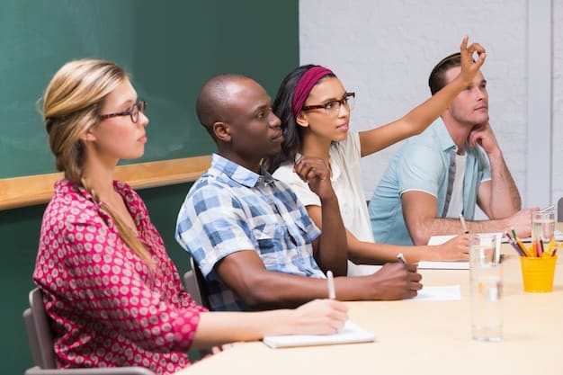 A group of teachers participating in a professional development workshop on anti-racist teaching practices, with posters on the walls displaying strategies for inclusive classroom management and culturally responsive curriculum design.