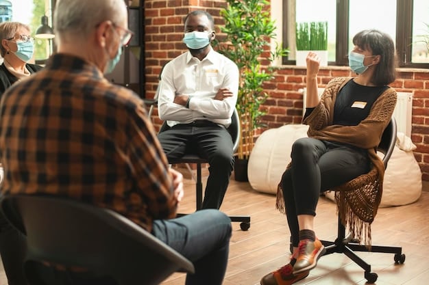 A diverse group of people participating in a group therapy session, symbolizing rehabilitation and support for drug offenders.