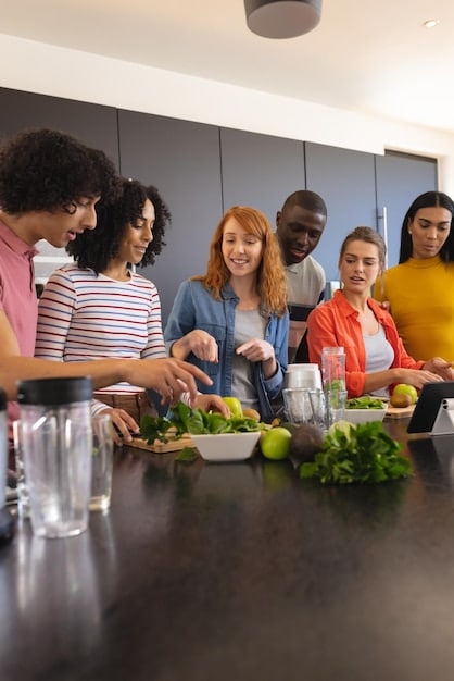 A group of diverse individuals participating in a health education workshop, learning about healthy eating and lifestyle choices. The setting is a community center, and the participants are engaged and interactive with the presenter. The atmosphere is positive and supportive. This image shows How Will the Updated 2025 National Public Health Initiatives Affect Your Community's Well-being?.