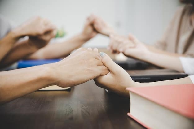 A close-up shot of a school counselor's hands clasped reassuringly, with a blurred background of a student looking comforted. The image emphasizes empathy and support within school mental health programs, illustrating an important aspect of Mental Health Support in Schools: Understanding the Latest Public Health Programs for Students.