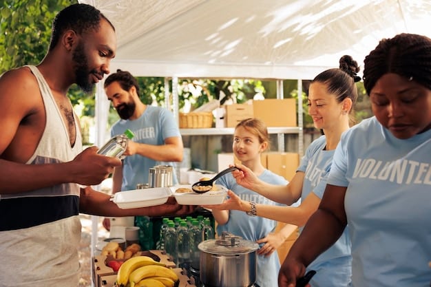 A group of volunteers is preparing and distributing healthy meals at a food bank, emphasizing the importance of addressing food insecurity as a health disparity.