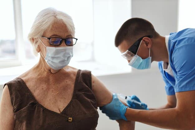 A community health worker administering a flu vaccine to a senior citizen at a local clinic. The health worker is smiling and providing reassurance, highlighting the importance of vaccination in preventing chronic diseases. The clinic setting emphasizes accessibility and community-based healthcare services.