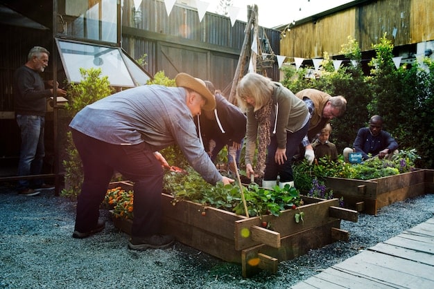 A community garden project where residents are working together to grow fresh produce. The scene represents community empowerment and the positive effects of investment in local resources, aligning with Debating the Merits of Defunding the Police: What are the Alternatives and Potential Outcomes? by showing an investment that addresses social needs.