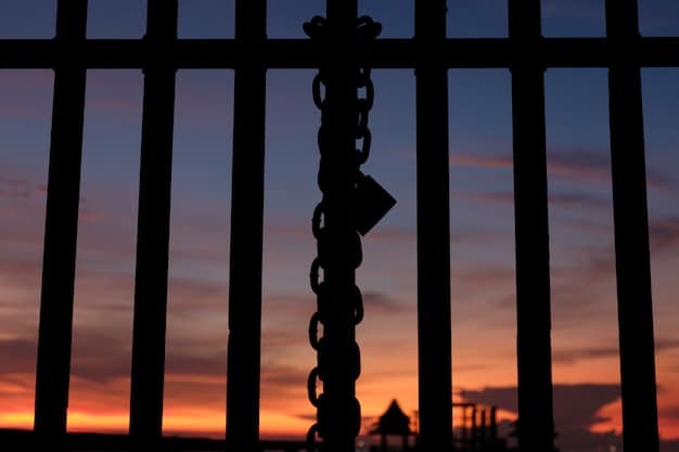 A close-up shot of prison bars casting shadows, symbolizing the limitations and restrictions imposed by the prison system. The image should evoke a sense of confinement and the challenges faced by incarcerated individuals and How Does the Prison System Contribute to Social Injustice? Exploring Alternatives to Incarceration in 2025.